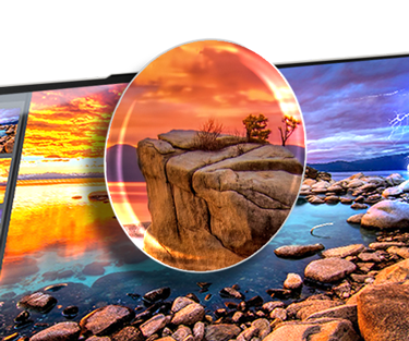 Portable Lenovo ouvert, écran montrant un gros plan des rochers côtiers