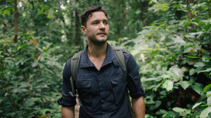 In forest with backpack