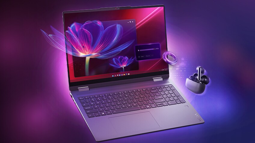 Lenovo laptop with a vivid purple and pink display showing a digital flower graphic, accompanied by wireless earbuds in a charging case, set against a glowing purple background.