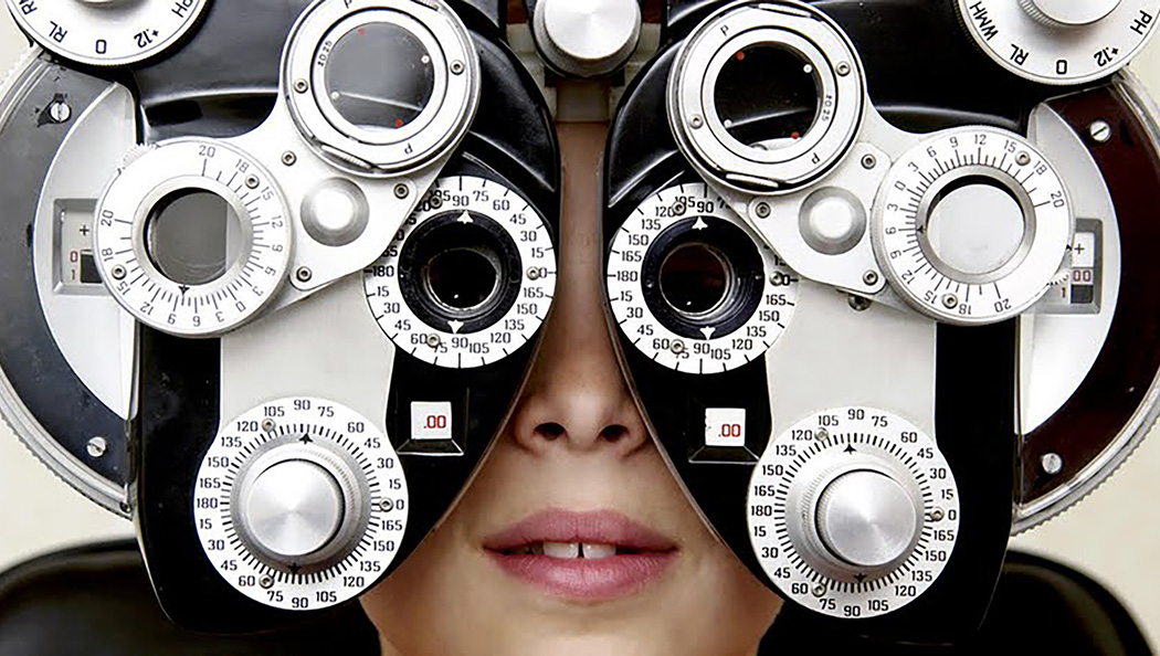 A young boy having his eyesight tested