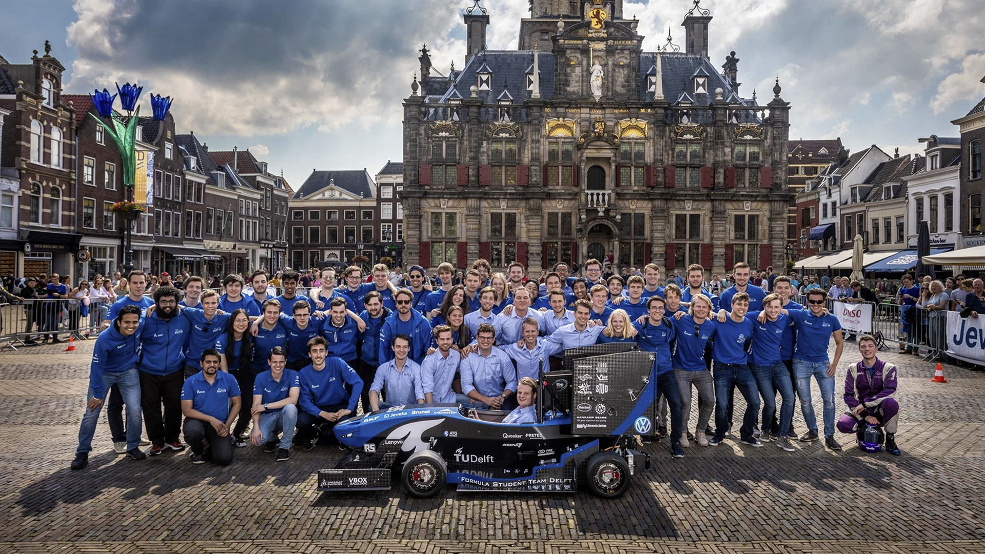 The TU Delft team with their Formula-style racecar