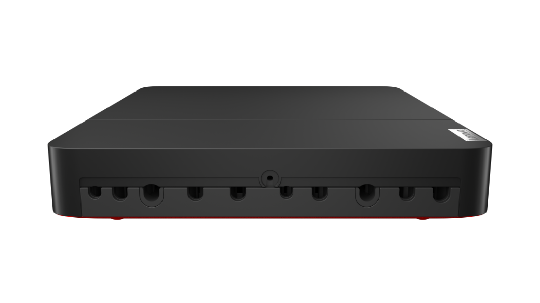 Overhead shot of Lenovo ThinkSmart Core computing device showing cable-management with closed cover on ports.