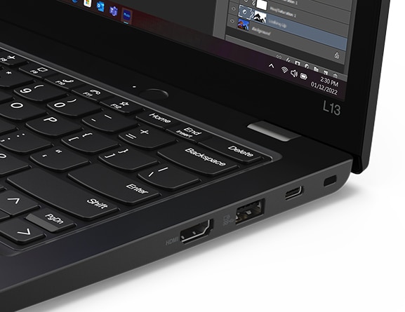 Angled, close-up of the keys and right-side ports on the Lenovo ThinkPad L13 G4.