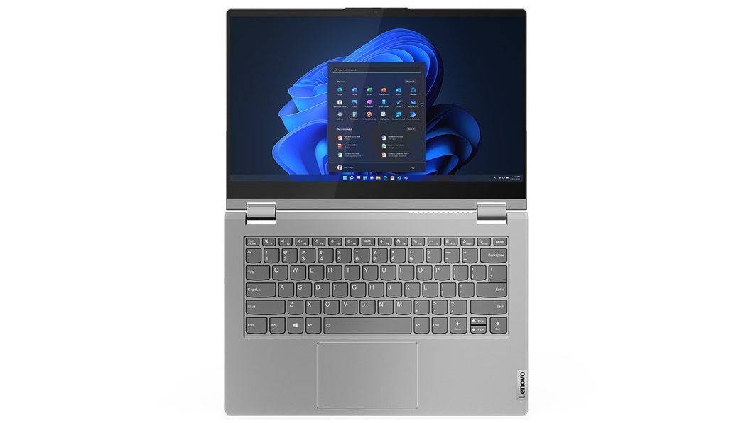 Vista superior del portátil 2-en-1 Lenovo ThinkBook 14 Yoga de 3.ª generación en color Mineral Grey, abierto en un ángulo de 180 grados con la pantalla y el teclado visibles.