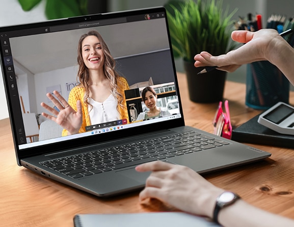A person using Lenovo IdeaPad 5i Gen 7 laptop PC for video conferencing.