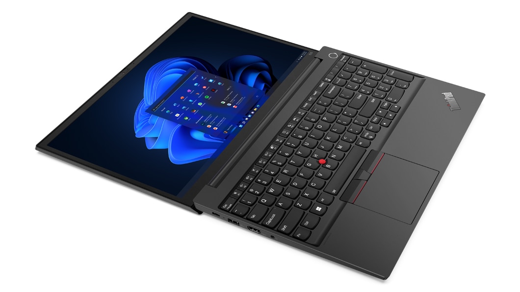 Aerial, left side view of Lenovo ThinkPad E15 Gen 4 (15” AMD) laptop, laid flat, opened 180 degrees, showing display and keyboard