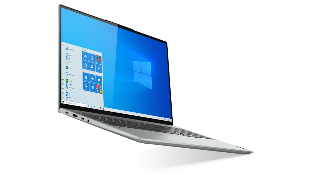 Yoga Slim 7 Pro de 6.ª generación, gris tormenta, parte superior abierta, pantalla encendida, mirando hacia la derecha