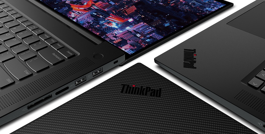 Close up of three Lenovo ThinkPad P1 Gen 6 (16″ Intel) mobile workstations, all laid flat next to each other. 
