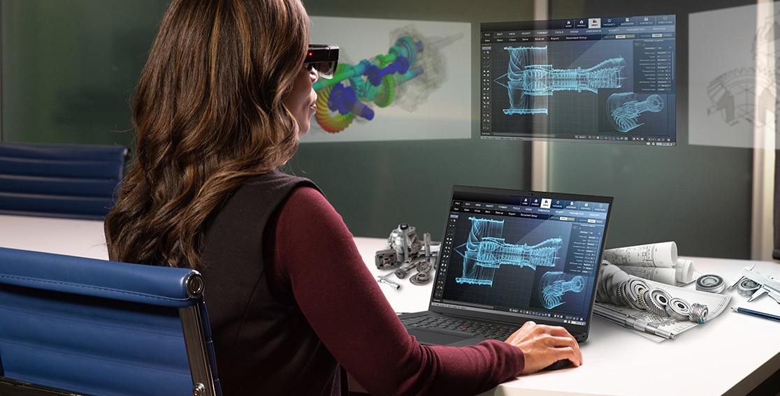 Industrial designer at work, wearing 3D glasses and using a Lenovo ThinkPad P1 Gen 6 (16″ Intel) mobile workstation, looking at a car design on the display
