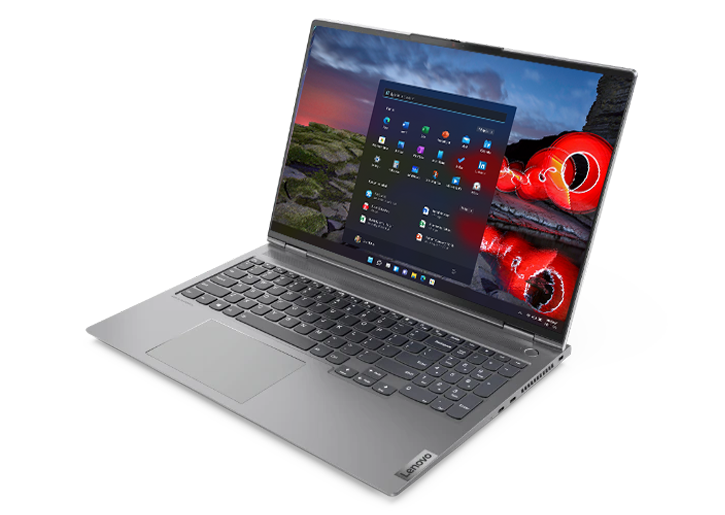 Lenovo ThinkBook 16p Gen 2 (16'' AMD) laptop – ¾ right-front view from slightly above, with lid open and image of dusk sky with concentric lines superimposed to emulate star patterns on the display