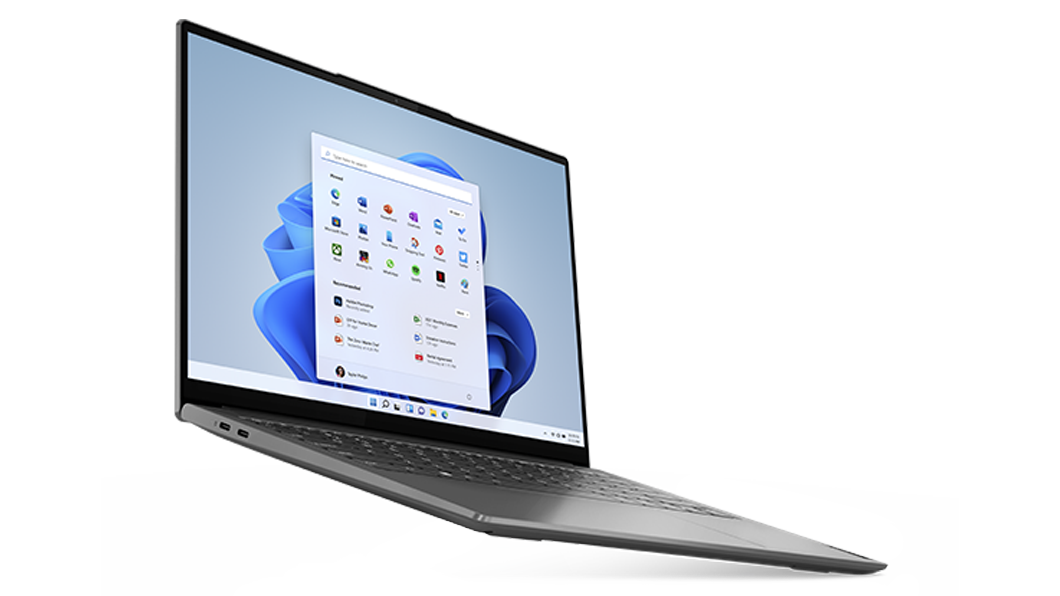 Yoga Slim 7 Pro Gen 7 (14 tuumaa, AMD) ‑kannettava vinoittain vasemmalta kuvattuna, avattuna, näyttö ja näppäimistö näkyvissä, näytössä Windows 11
