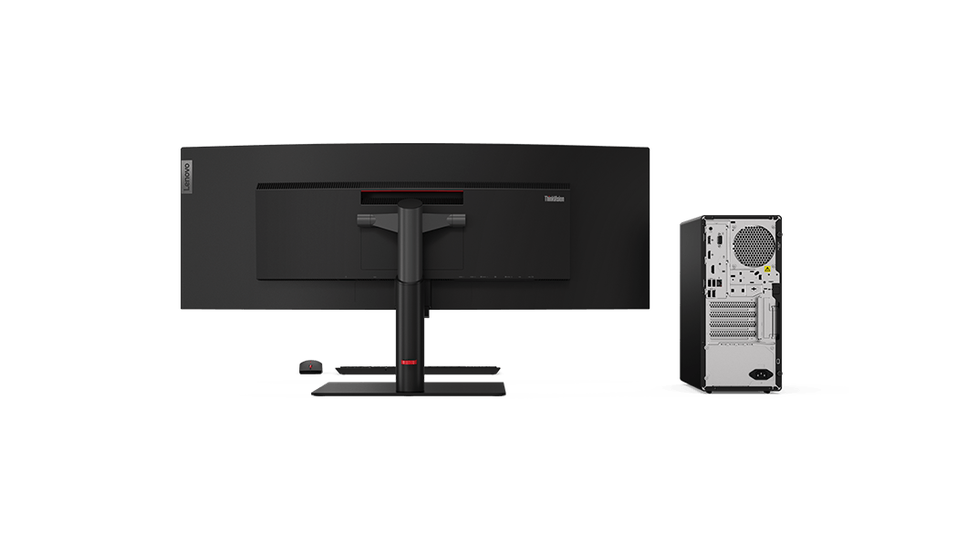 Rear view of the ThinkCenter M90t tower desktop on the right with monitor, keyboard, and mouse
