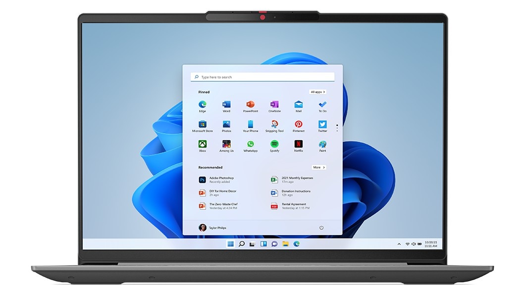 Front-facing IdeaPad Slim 5i Gen 8 laptop, showing keyboard edge & display with Windows 11 bloom