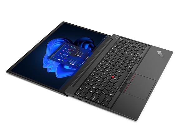 Left side view of ThinkPad E14 Gen 4 business laptop, opened 180 degrees flat, showing keyboard and display with Windows 11