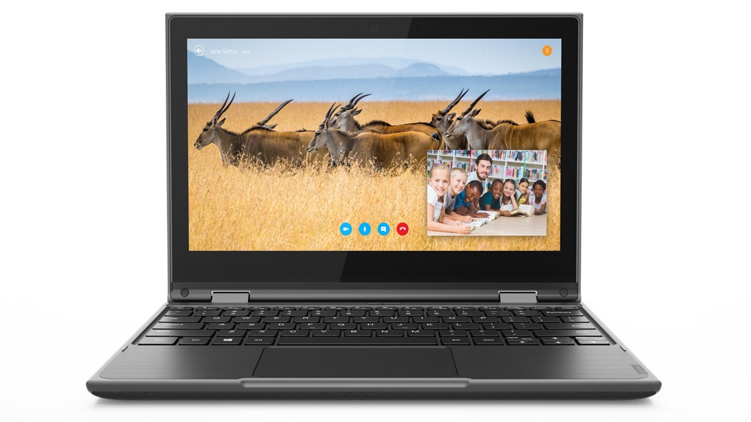Lenovo 300e Windows laptop, front view showing skype chat on display.