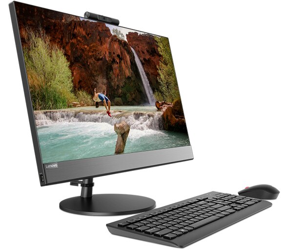 Lenovo V530 AIO, front left side view with vivid waterfall image on display.