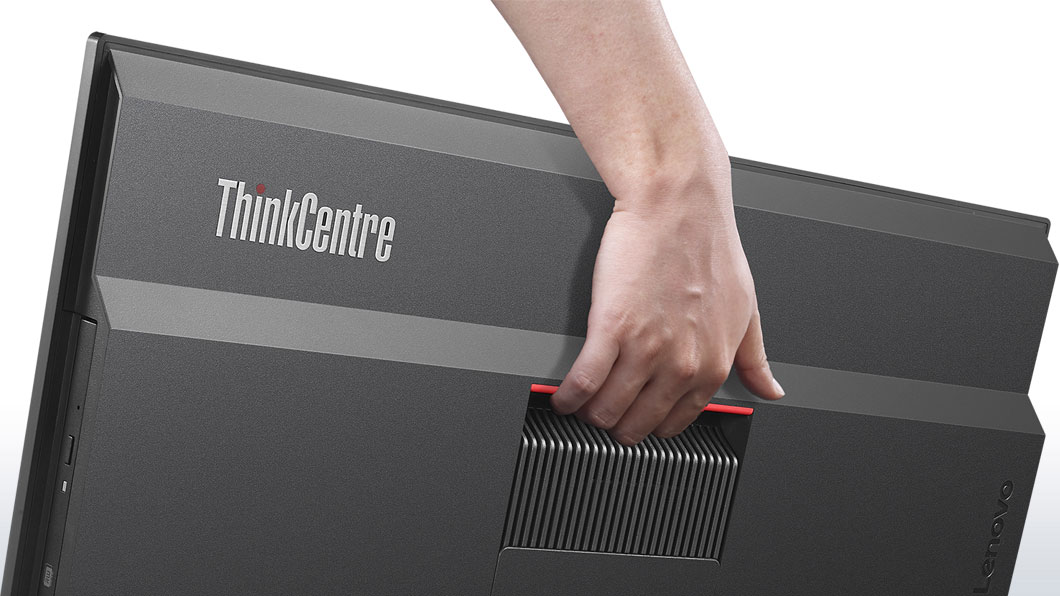 Lenovo ThinkCentre M700z AIO, back side view with hand gripping integrated carrying hold