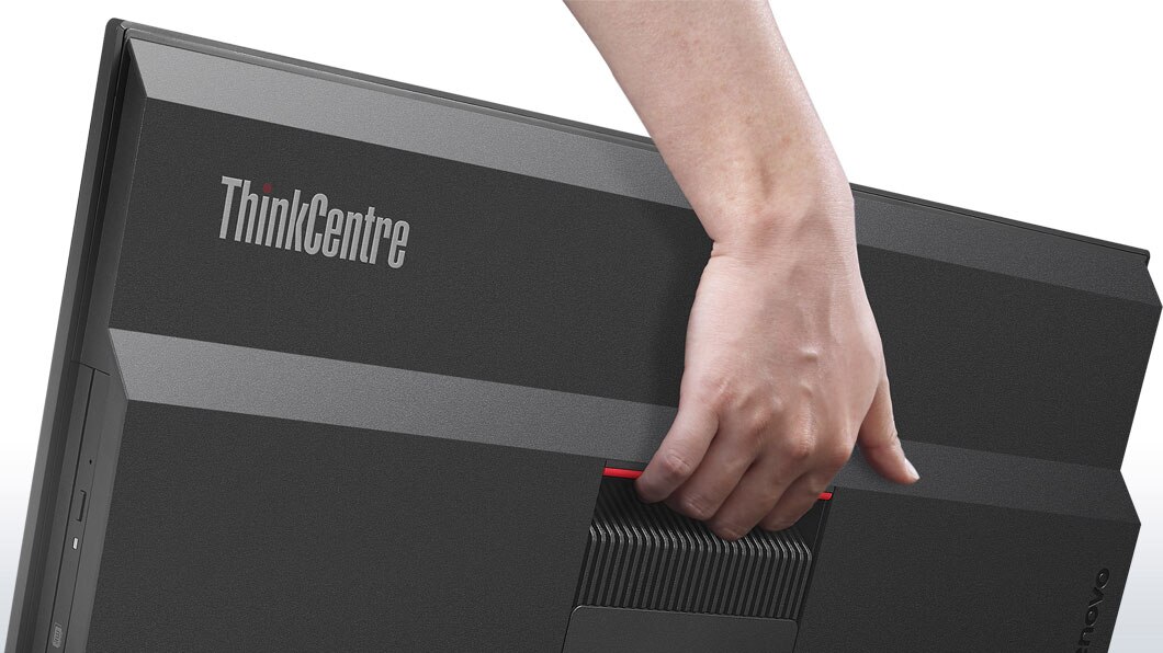 Lenovo ThinkCentre M800z AIO, back view showing hand holding integrated handle