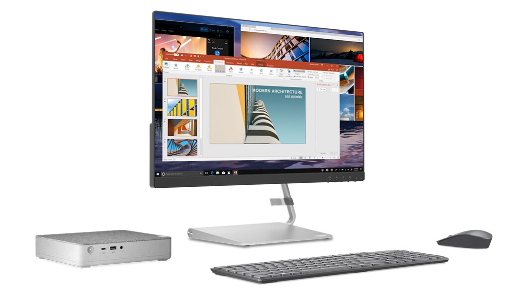 Schrägansicht von links – IdeaCentre Mini 5i-Desktop links neben einem Monitor, einer Funktastatur und einer Funkmaus