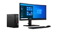 Left-angle view of the ThinkCenter M70c desktop with monitor, keyboard, and mouse