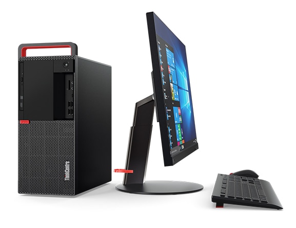 Side view of Lenovo ThinkCentre M920 Tower alongside monitor, wireless keyboard and mouse