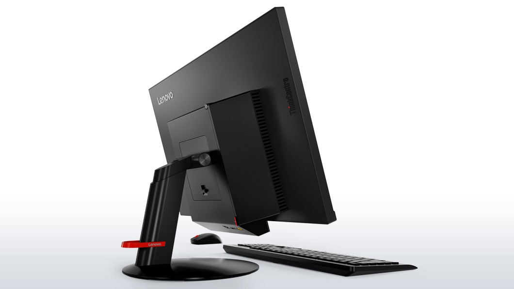 Lenovo ThinkCentre Tiny-in-One 24, back left side view with keyboard and mouse