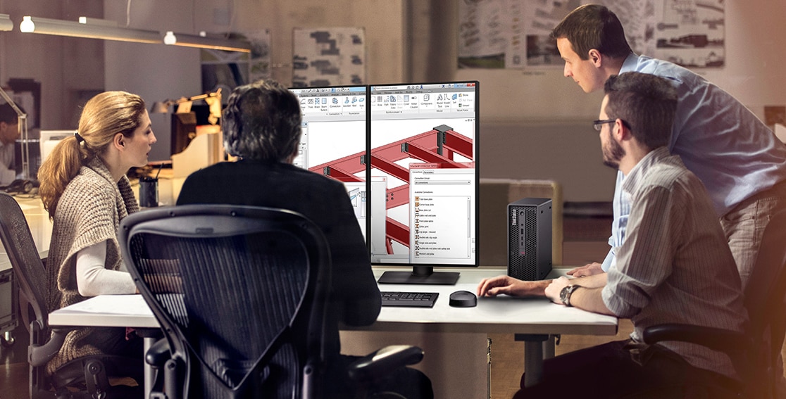 Lenovo ThinkStation P360 Ultra workstation in use alongside dual monitors with engineering diagram on the screen.