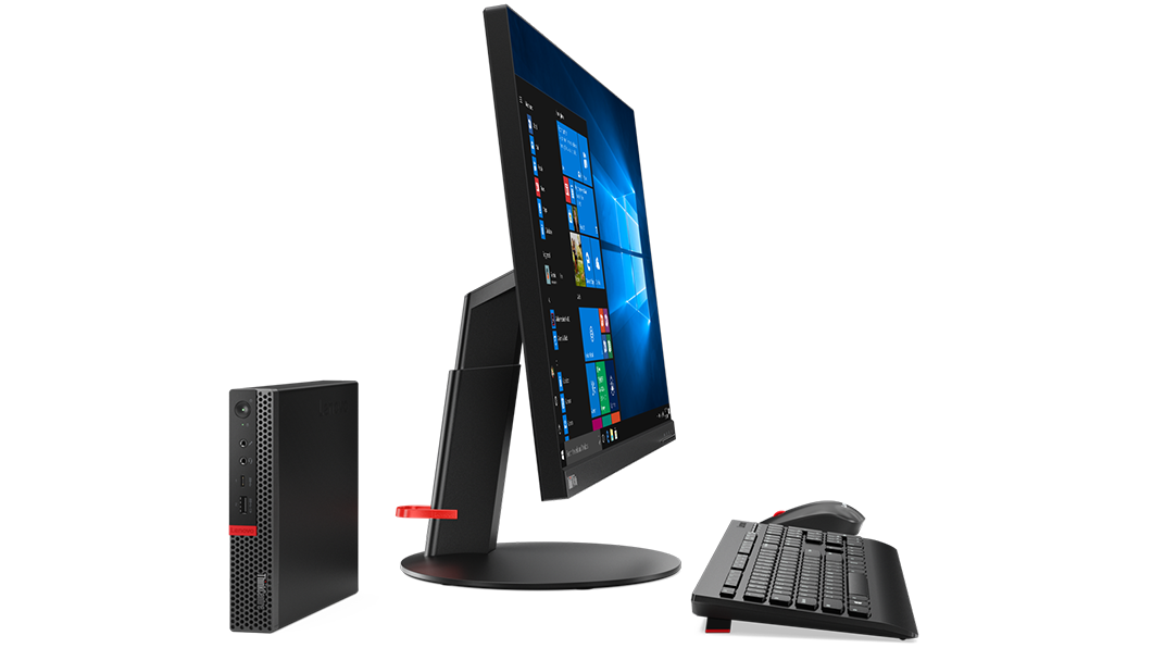 Front view of Lenovo ThinkCentre M920 Tiny set next to side facing display, keyboard and mouse