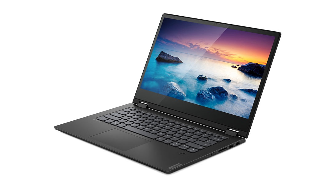 Side shot of the IdeaPad C340 (14, AMD) with the display open, showing an off-shore scene with some rocks