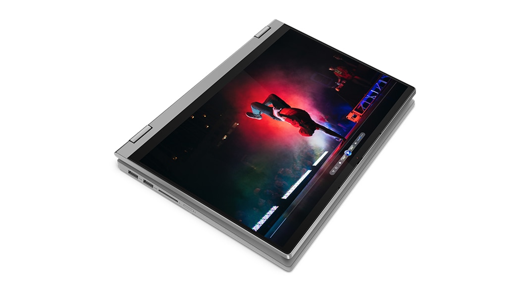 L’ordinateur portable IdeaPad Flex 5 gris platine replié affichant une vidéo