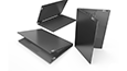 Three charcoal grey IdeaPad Flex 5 laptops in various positions