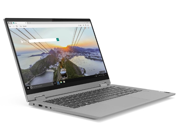 IDEAPAD FLEX 5 (15″ AMD) PLATINUM GREY IN LAPTOP MODE SCREEN ON, FRONT VIEW FACING RIGHT, LEFT SIDE VIEW