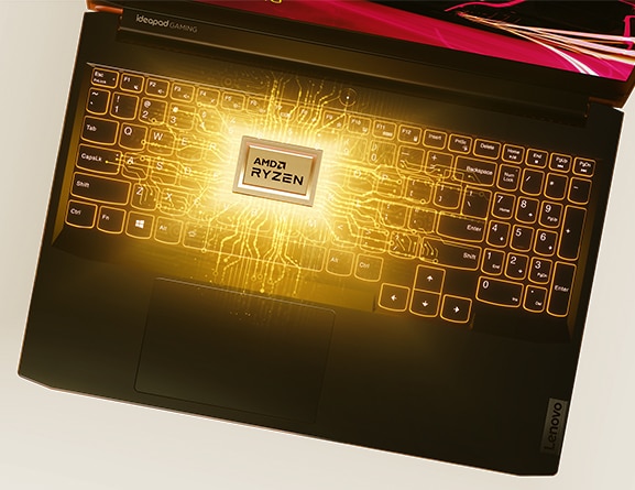 Lenovo IdeaPad Gaming 3 Gen 6 (15” AMD) laptop, top view showing keyboard and an AMD Ryzen logo surrounded by light effects