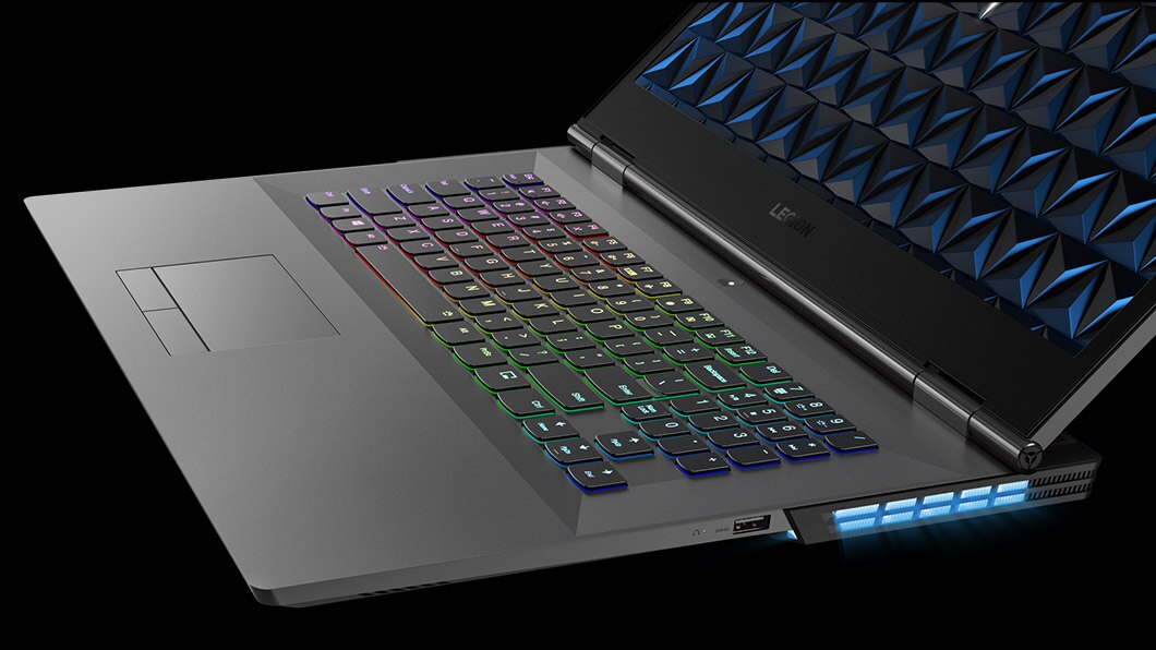 Legion Y530 17-inch gaming laptop - right side view, open with closeup of RGB-backlit keyboard