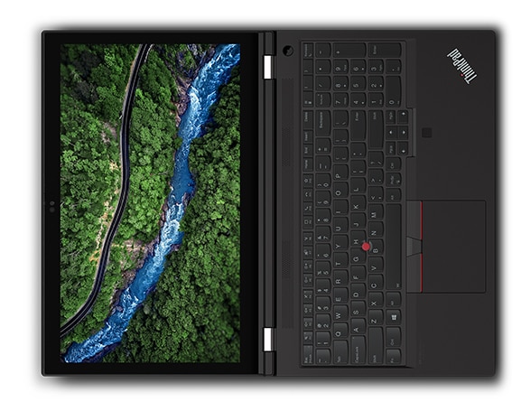 Overhead shot of the Lenovo ThinkPad P15 Gen 2 laptop open 180 degrees, positioned horizontally, with river and trees shown on screen.