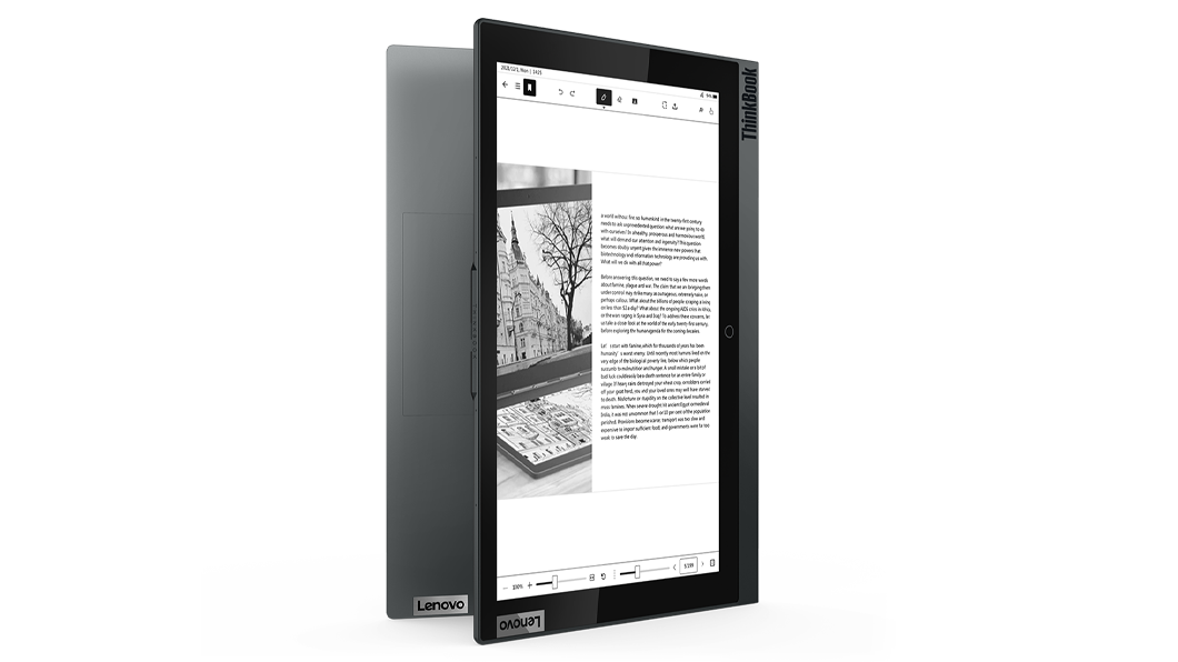 Vista de la laptop para trabajar Lenovo ThinkBook Plus 2da Gen semicerrada parada en uno de sus perfiles, con la pantalla de tinta electrónica en la tapa a la vista