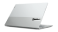 Left-rear, low-angle view of a Lenovo ThinkBook 13x laptop, open 75 degrees to show the dual-tone Cloud Gray top cover and distinctive ThinkBook logo.