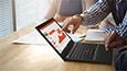 ThinkPad L380 Ultraportable Enterprise Laptop - thumbnail image - lifestyle shot, hands pointing to graph on display