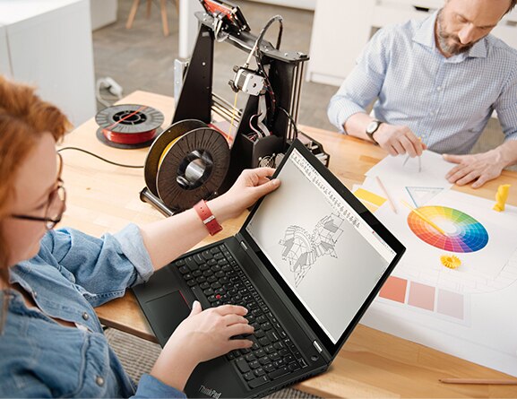ThinkPad T15g Laptop, in use by a woman in an industrial design setting