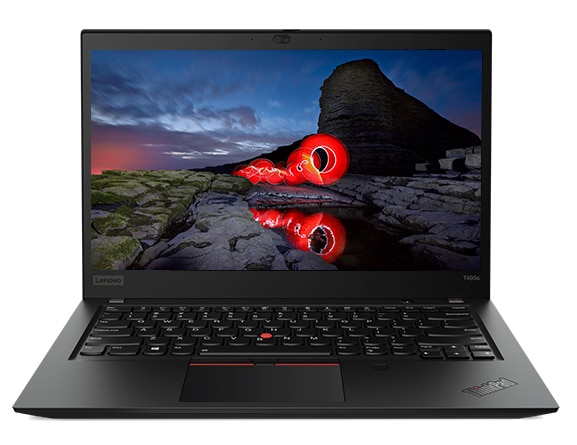 An opened ThinkPad T495s laptop, showing a dramatic volcanic scene with red flowing lava