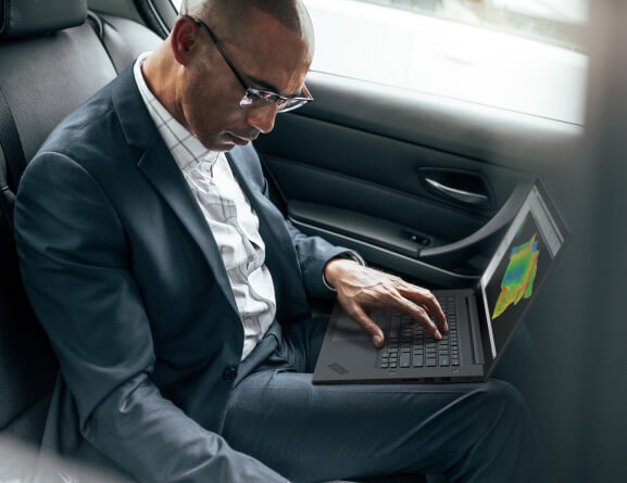 Lenovo ThinkPad P1 Gen 3 mobile workstation in use on a man's lap.