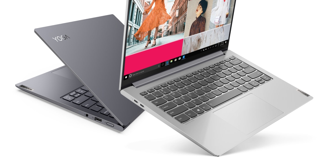 2 Lenovo Yoga Slim 7i Pro 14 inch laptops in light silver and slate gray colors.