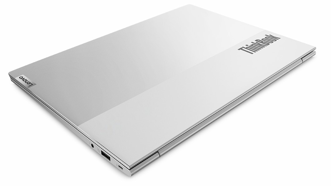 Ein zweifarbiges ThinkBook 13s Gen 4 (Intel) Notebook, Ansicht in einem 30°-Winkel von hinten rechts, mit geschlossenem Deckel und Blick auf das charakteristische ThinkBook Logo sowie die Anschlüsse auf der rechten Seite.
