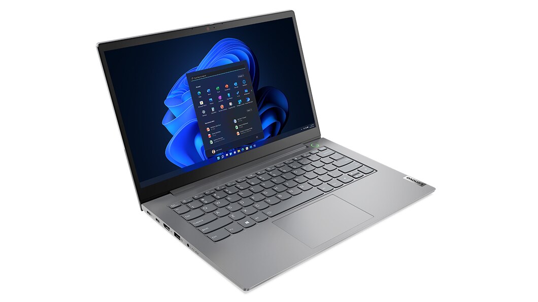 Ansicht eines geöffneten Lenovo ThinkBook 14 Gen 4 (Intel) Notebooks von schräg oben links mit Blick auf Tastatur, Trackpad und Display