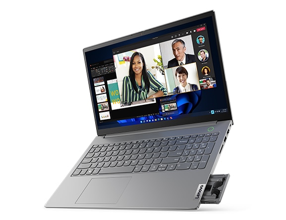 Top right angle view of a Lenovo ThinkBook 15 Gen 4 (Intel) laptop with a conferencing app on the display and the Versa Bay open