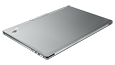 Closed-cover recycled aluminum Lenovo ThinkPad Z16 laptop, angled to show right-side ports and rear hinge.