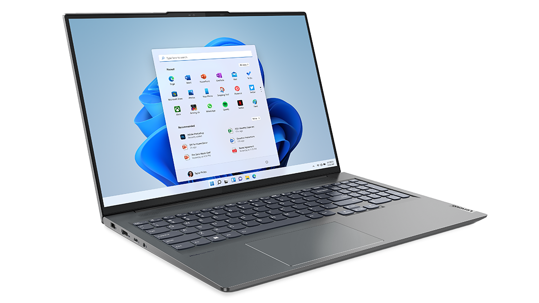 Vista laterale destra del notebook Lenovo Yoga Slim 7i Pro di settima generazione aperto, che mostra lo schermo e la tastiera