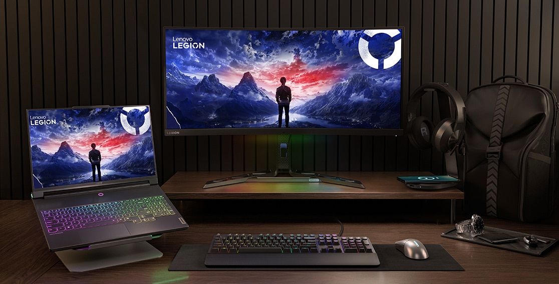 Legion 9i (16″ Intel) at a desk on a laptop stand surrounded by Legion accessories family