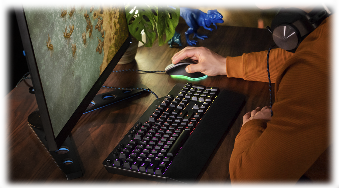 A true Lenovo Legion gamer in action - with Legion mouse, keyboard, monitor, and headphone accessories