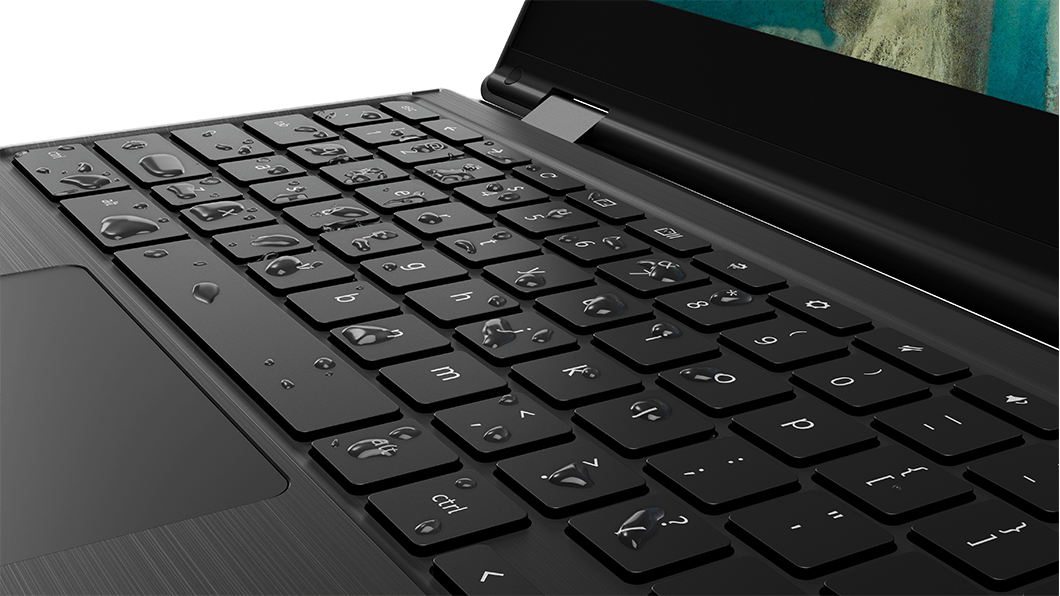 Closeup of the Lenovo 300e Chromebook 2nd Gen AST laptop with water on the keyboardt